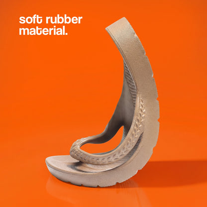 A flexible sandal bent to showcase its soft rubber material construction.