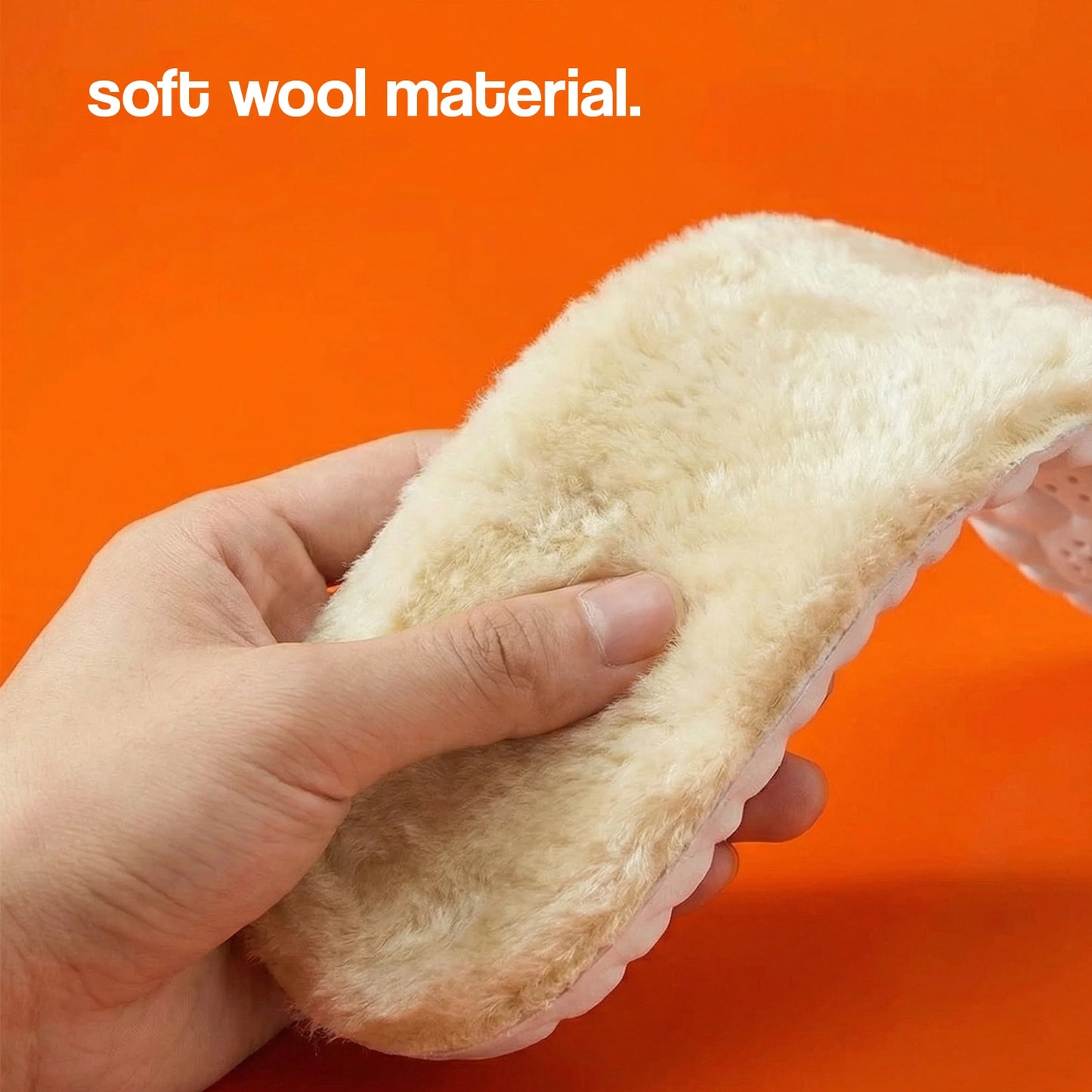 Hand holding a soft wool material insole against an orange background with text 'soft wool material'.